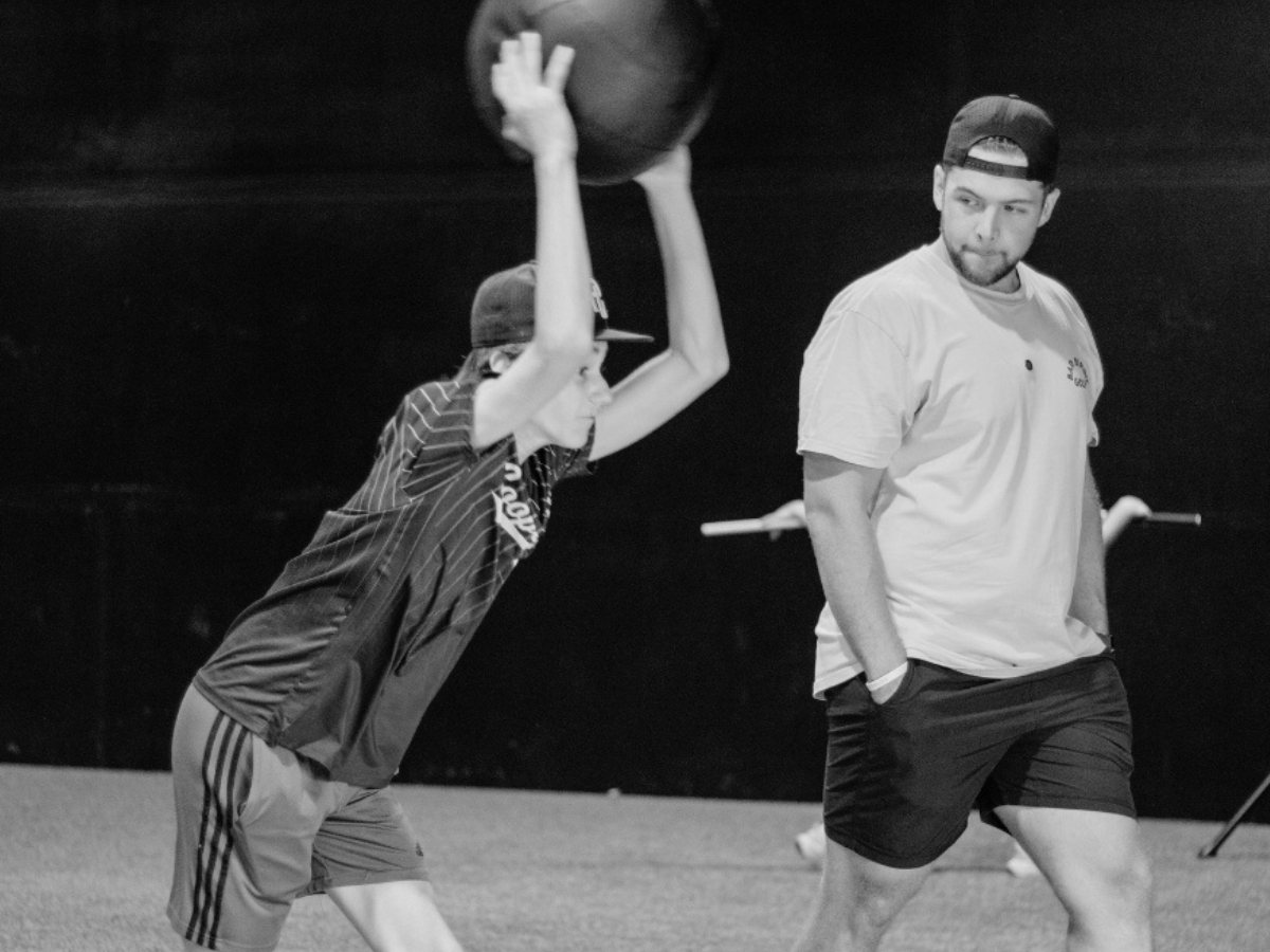 Competitive athlete completing progressive strength training during rehab